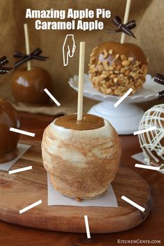 an apple pie caramel apple on a wooden tray