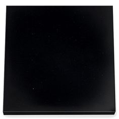 a black square shaped object on a white background