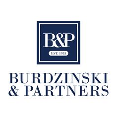 the logo for burdzninski and partners, which is located in an office building