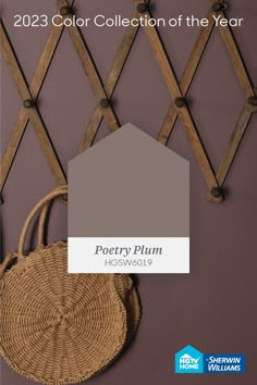 a brown wall with a basket hanging from it's side and the words, color collection of the year