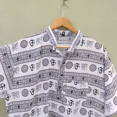 Om meditation kurta is a perfect cloth to wear during any spiritual prayer or yoga session. Gives so much positive energy. Handmade in our manufacturing unit. Size - Please check images for size chart Fabric - Cotton Washing instructions ----- Normal machine wash Do not bleach. Casual Short Sleeve Kurta For Festive Occasions, Traditional White Shirt For Festivals, Traditional Printed Shirt For Festivals, Traditional Cotton Shirt For Festivals, Casual Block Print Kurta For Festive Occasions, Casual Block Print Kurta For Navratri, Traditional Short Sleeve Summer Kurta, Traditional Relaxed Fit Kurta For Festive Occasions, Festive Traditional Kurta With Relaxed Fit