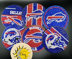 six buffalo bills coasters made out of bead and sequinized glass beads