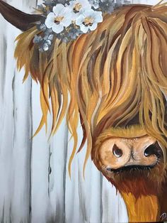 a painting of a cow with long hair and flowers on it's head is shown