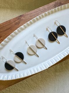 Parker Hoops in Black, Ivory or Black/Ivory are the perfect neutral earring. Wear dressed up or casual! Availble in gold or silver accent. Black Ceramic Jewelry, Neutral Earrings, Black Earrings Dangle, Earrings Black, Modern Earrings, Silver Accents, Polymer Clay Jewelry, Clay Jewelry, Wisconsin