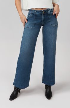 The Nova is our new slouchy wide-leg jean—featuring a mid rise and relaxed fit for all-day ease. Crafted from our semi-stretch denim, they provide a lived-in look without compromising on comfort. TRUE TO SIZE Mid-Rise Wide Leg Jeans  Front Rise: 9.5" Inseam: 30" Regular Hem Available in Plus Sizes: Size 24 - 42 Model is 5'9" Tall / Wearing a size 26 99% Cotton / 1% Spandex Machine wash cold / Tumble dry low Versatile Dark Wash Flare Jeans With Pockets, Everyday Cropped Leg Cargo Jeans, Casual Mid-rise Wide Leg Pants For Everyday, Versatile Relaxed Fit Wide Leg Cropped Jeans, Versatile Wide Leg Cropped Jeans With Relaxed Fit, Versatile Wide-leg Cropped Denim Jeans, Casual Wide Leg Cropped Jeans With Patch Pockets, Everyday Mid-rise Medium Wash Cargo Jeans, Everyday Mid-rise Cargo Jeans In Medium Wash