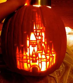 a pumpkin carved to look like a castle