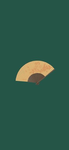 an orange and brown fan against a dark green background in the shape of a hand fan