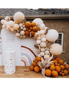 an outdoor display with balloons and decorations