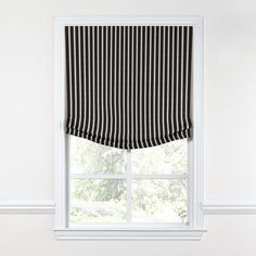 a black and white striped window valance