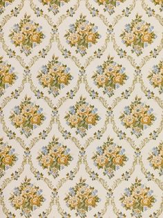 an old fashioned wallpaper with flowers and leaves on it's side, in yellow and blue colors