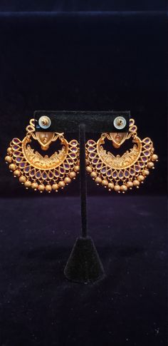 "Handmade Indian Temple Jewelry, best to wear it for traditional ceremonies or Indian wedding. This bridal jewelry has ethnic finish. It has very small Cubic Zircon stones. It is a Bollywood style one gram jewelry These Jhumka Earrings set have an excellent finish and gives out an exquisite sense of style. If you are looking for an amazing Fashion Jewelry set for special occasions such as Anniversary, Engagement, Party, Wedding or for gifting, then your search ends here.. Earring Length: 2.0\", Ornate Chandelier Earrings With Intricate Design For Ceremonial Occasions, Ornate Chandelier Earrings With Intricate Design For Ceremonies, Ornate Ceremonial Chandelier Earrings With Intricate Design, Temple Jewelry Chandbali Pearl Earrings With Intricate Design, Temple Style Tilla Earrings For Wedding, Festival Chandbali Earrings With Intricate Design, Chandbali Earrings With Intricate Design For Festivals, Chandbali Earrings With Intricate Design For Celebration, Intricate Design Chandbali Earrings For Celebration