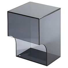 a black and clear glass object on a white background in the shape of a cube