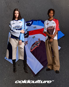 two women standing next to each other in front of three different colored t - shirts