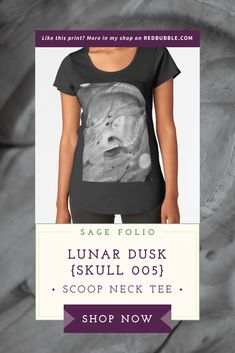 a woman wearing a t - shirt with an image of a dog on it and the text, sage follo lunar dusk skul 005 scoop neck tee