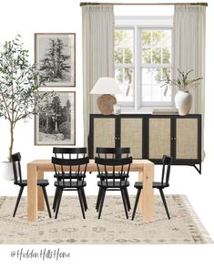 a dining room table and chairs in front of a window with pictures on the wall