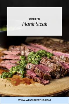 grilled flank steak with chimica sauce on a wooden platter and text overlay that reads grilled flank steak