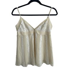 "Beautiful cream white tank top with adjustable spaghetti straps.  BCBG MAXAZRIA.  Babydoll / empire waist.  100% silk, lined with rayon.  Striped sequin segments on body and bust.  No size tag, fits like a 2/4.  Length 19\" not including the strap (measured from the top of the bust triangle). Pit to pit 16.5\". Under bust 15.5\".  In excellent condition. Rarely (if ever) worn. Personally owned." Vintage Overalls, Womens Tank Tops, Gold Fabric, Babydoll Top, Vintage Y2k, White Tank Top, White Tank, Womens Tank, Size Tag