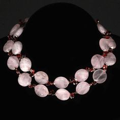 This is part of Chairish’s Fine Jewelry assortment.  Elegant Garnet and Rose Quartz Necklace – 27 Inches of Sparkling Beauty  Elevate your Spring and Summer wardrobes with this unique, elegant necklace featuring sparkling faceted Garnet briolettes and glowing Rose Quartz discs. The 6mm Garnet briolettes flutter delicately between the 16mm round Rose Quartz discs, creating a dynamic contrast of color and texture. Silver-tone flutters add a touch of whimsy, while the Sterling Silver toggle clasp e Quartz Mineral, Rare Roses, Blue Beaded Necklace, Gold Bead Necklace, Rose Quartz Necklace, Rose Quartz Beads, Unique Necklace, Lovely Necklace, Elegant Necklaces