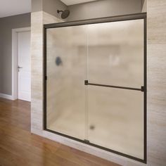 an empty room with a glass shower door