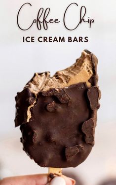 an ice cream bar is being held up in front of the camera with text that reads vegan + pale coffee chip ice cream bars