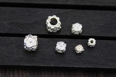 4mm/5mm/6mm/8mm Sterling Silver Flower Beads,Silver Flower Cube Beads,Silver Flower Beads,Flower Spacer Beads Material: 925 sterling silver Color: bright silver 1# Size: Dia 4MM Hole 1.3MM Weight 0.37G 2# Size: Dia 5MM Hole 1.5MM Weight 0.66G 3# Size: Dia 6 MM Hole 2.5MM Weight 0.83G 4# Size: Dia8 MM Hole 4.3MM Weight 1.9G QTY: Pls choose yr QTY from options We can discount price for big qty order, pls kindly conver us for details,thank you! Silver Flower Jewelry With Spacer Beads, Silver Spacer Beads Round Shape, Sterling Silver Spacer Beads, Beads Flower, Cube Beads, Flower Beads, Beaded Material, Sterling Silver Flowers, Discount Price