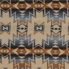 a blue and brown pattern on fabric