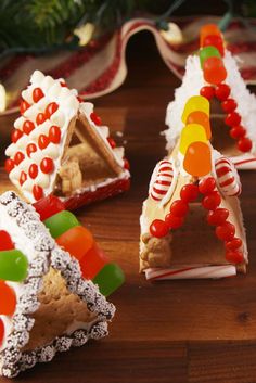 some very cute little houses made out of candy