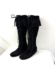 Great vintage shape. Minnetonka - newer see tag Love the fringe!  Size is 7 Sole length: ~10" Width of sole at ball: 3 1/4" ~17" high Moccasins Boots, Vintage Fringe, Moccasin Boots, Boot Shoes Women, Moccasins, Festival Season, Black Suede, Womens Boots, Shoe Boots