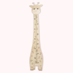 a giraffe height chart is shown on a white background and it's made out of cardboard