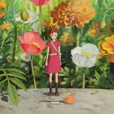 a girl in a pink dress standing next to flowers