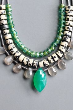 16” triple strand necklace with green onyx, gray moon stone, dalmatian jasper, glass, and hematite. 3 inch extender. Maxi Jumpsuit, Dalmatian Jasper, Swimwear Sets, Green Onyx, Long Sleeve Midi, Multi Strand Necklace, Skirt Leggings, Moon Stone, Strand Necklace