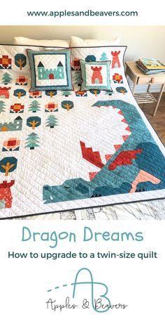 a bed with a quilt on top of it and the words dragon dreams above it