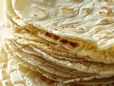 a stack of tortillas sitting on top of each other