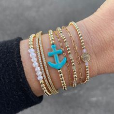 "Hope anchors the soul" Embrace the essence of elegance and strength with our Anchor Bead Bracelet. We can all appreciate the deeper meaning of the anchor, a symbol of security, stability, and being grounded and holding on to the values you believe in. Made with 4mm quality 14kt gold fill beads strung on durable high performance elastic accented with a dyed turquoise howlite anchor bead measuring approximately 1 inch. This meaningful and timeless piece is sure to become a favorite in your collec Being Grounded, Hope Anchors The Soul, Deeper Meaning, Everyday Bracelet, Pearl Strand, The Anchor, Rose Gold Chain, Turquoise Howlite, Pearl Strands