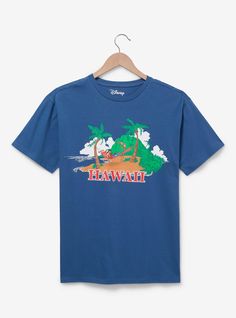 Hop aboard the Hawaiian roller coaster ride with this scenic tee! This Lilo & Stitch shirt features a print of the lush island of Kauai  with Lilo and Stitch relaxing on a beachside hammock. "Hawaii" is printed below the palms  adding a tropical touch to your next vacation  beach visit  or trip to the Disney Parks!A BoxLunch Exclusive!Cotton Listed in unisex sizes Wash cold with like colors; dry low Do not iron over print Imported Blue Hawaiian T-shirt With Crew Neck, Blue Hawaiian Crew Neck T-shirt, Graphic Print Tops For Summer Disney Trips, Disney Trips Graphic Print Crew Neck T-shirt, Casual Graphic T-shirt For Disney Trips, Casual Graphic Print T-shirt For Disney Trips, Blue Graphic T-shirt For Disney Trips, Casual Tops For Disney Trips In Summer, Casual Tops For Summer Disney Trips