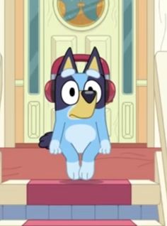 a cartoon dog with headphones sitting on the steps