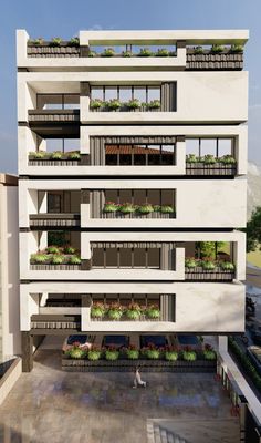 an apartment building with balconies and plants on the balconies are shown