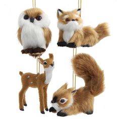 three different types of stuffed animals hanging from strings