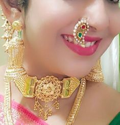 Elevate your traditional Maharashtrian look with our exquisite 💛 Gold Plated Clip Nath - a stunning piece of Indian jewelry that effortlessly captures the essence of cultural richness. Designed for both pierced and non-pierced noses, this versatile Clip On Nose Ring adds a touch of elegance without the need for piercing. ✨ Crafted with precision and care, our High-Quality gold plated Clip Nath boasts intricate detailing, mimicking the opulence of real gold. The left-side orientation ensures aut Tilla Jewelry For Marriage And Festivals, Traditional Jewelry For Marriage And Festivals, Traditional Rings With Intricate Design For Festivals, Traditional Meenakari Jewelry For Marriage, Traditional Jewelry With Intricate Design For Marriage, Traditional Jewelry For Marriage With Intricate Design, Traditional Jewelry With Latkans For Marriage, Traditional Latkans Jewelry For Marriage, Traditional Bridal Sets With Tilla For Marriage