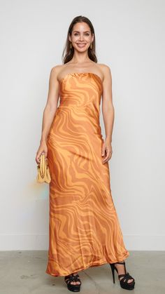 Turn heads with our vibrant Lauvy Maxi Dress, a kaleidoscope of hues that radiate joy and vitality. Designed to make a statement, its bold palette and flowing silhouette effortlessly capture the essence of fun. Features: Maxi dress Strapless Orange 81231 A4-1 Multicolor Abstract Print Dress For Parties, Orange Strapless Vacation Dress, Sleeveless Midi Dress With Vibrant Print For Party, Party Dresses With Abstract Print In Midi Length, Vibrant Print Sundress Maxi Dress For Party, Vibrant Print Sundress For Party, Chic Abstract Print Midi Dress For Party, Spring Party Maxi Dress With Abstract Print, Summer Party Dress With Abstract Print