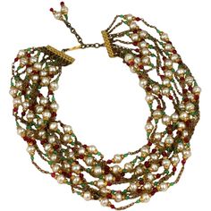 Chanel multi chain pearl, emerald and ruby handmade glass collar. Designed by Gripoix mid 1950s to look as though each strand is casually wrapped around the neck, a part of the Chanel idiom of an instictive effortless elegance. Unsigned 16-19" lengths, 2.5" width Many necklaces from the period become available in these wonderfully crude metal tones, not with the hypergilding used today. This heightens and reinforces the baroque aspect of the jewel as prescribed by Chanel's rich aesthetic. Gold Costume Jewelry, Walmart Jewelry, Vintage Beads Necklace, Costume Necklaces, Costume Jewelry Necklaces, Chanel Jewelry, Designer Fashion Jewelry, April 27, Jewelry Diamond