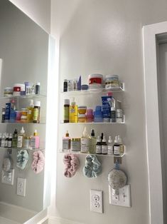 the shelves are filled with bottles and other personal care items