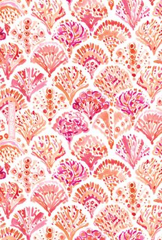 an orange and pink flower pattern on a white background