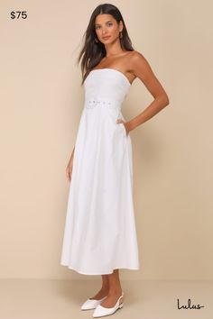 There's always going to be a compliment coming your way when you wear the Lulus Trendsetting Choice White Strapless Midi Dress With Pockets! Lightweight woven poplin shapes this eye-catching dress that has a strapless bodice with folded trim and hidden no-slip strips. Fitted waist boasts a chunky removable belt, atop a pleated A-line skirt with side seam pockets and a midi hem. Hidden zipper/clasp at side. Fit: This garment fits true to size. Length: Size medium Bust: Works best for A to C cup s Elegant Bandeau Dress For Day Out, Cotton Sundress Maxi Dress For Date Night, Cotton Dress With Straight Neckline For Day Out, Sleeveless Cotton Maxi Dress For Date Night, Summer Cotton Strapless Maxi Dress, Cotton Sleeveless Maxi Dress For Date Night, White Cotton Midi Dress For Evening, Strapless Cotton Maxi Dress For Spring, Cotton Strapless Maxi Dress For Spring