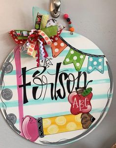 this is a personalized door hanger for a child's room or playroom