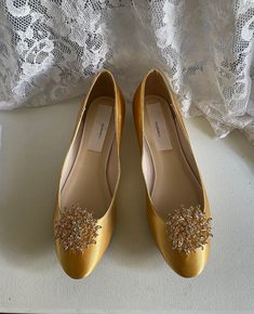 "Beautiful and elegant almost Flat Satin Shoes, heel is only 1/2\" it adds beauty and elegance to this classic style; crystals embellishment only GOLD Color; shoes pictured Gold/Mustard color, i suggest to order color swatches samples if, you need a close match to your color, below find the link to order color swatches. BY PURCHASING THIS LISTING, YOU AGREE TO HAVE READ ALL INFORMATION, AND SHOP POLICIES. THANK YOU! EVERY SHOES ORDER IS HAND EMBELLISHED IN ORDER OF ARRIVAL THEREFORE, SHOES CAN N Elegant Rhinestone Wedding Flats, Elegant Wedding Flats With Rhinestones, Elegant Flat Wedding Shoes With Rhinestones, Elegant Flat Wedding Shoes For Evening, Gold Pointed Toe Shoe Clips For Wedding, Formal Closed Toe Flats With Rhinestones, Elegant Closed Toe Flats With Rhinestones, Elegant Low Heel Wedding Flats, Gold Low Heel Flats For Party