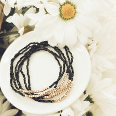 Elevate your style with our Black Stacking Bracelets. These beautiful pieces bring a touch of nature's beauty to your wrist. Mix and match for a stunning, boho-chic look. Stacking Bracelets, Black Bracelet, Book Jewelry, Yellow Earrings, Black Bracelets, Holiday Jewelry, Wood Earrings, Leather Necklace, Bracelet Stack