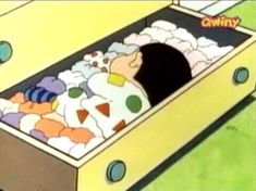 an animated image of a child in a toy bed with toys inside it and the caption that reads, ohmy