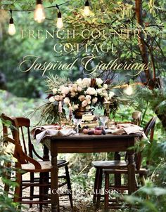 the cover of french greenery cottage garden, featuring two wooden chairs and a table with flowers on it