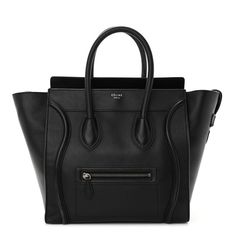 This is an authentic CELINE Drummed Calfskin Mini Luggage in Black. This sophisticated tote is crafted of calfskin leather in black. This handbag features rolled leather top handles, an exterior zipper pocket, expandable sides, and the top zipper opens to a black suede interior with zipper and patch pockets. Luggage Black, Mini Luggage, Leather Top, Black Suede, A Black, Patch Pocket, Drums, Zipper Pocket, Calf Skin